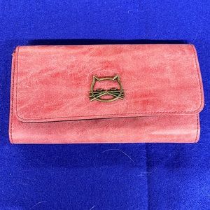 Red leather clutch / brand unknown